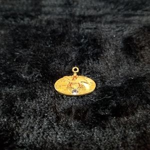 10K Yellow Gold Anheuser-Busch Charm w/Light Topaz Blue Stone